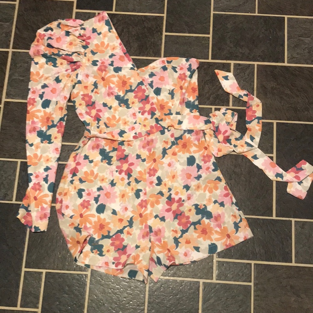 Floral shorts one-sleeve romper.